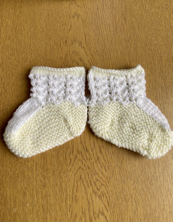 Hand-knitted baby booties